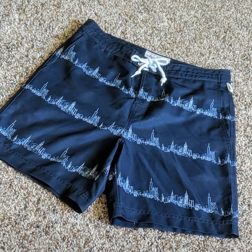 Penguin swim trunks